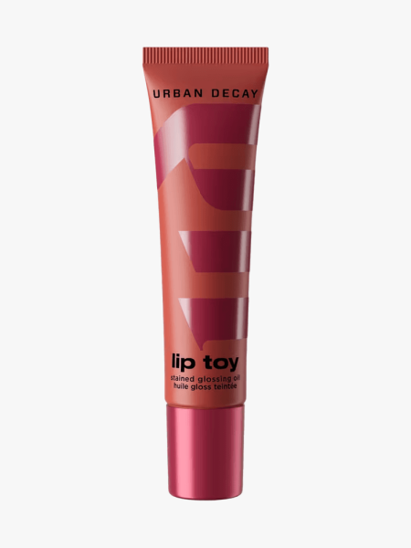 Urban Decay Lip Toy pH Lip Staining Oil in branded tube component on a light gray background